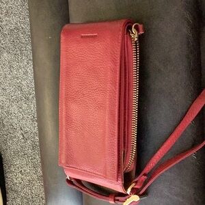 Levenger Red Leather Crossbody Bag with Sleek Design